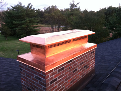 Before and after chimney cap replacement in Lynbrook, NY