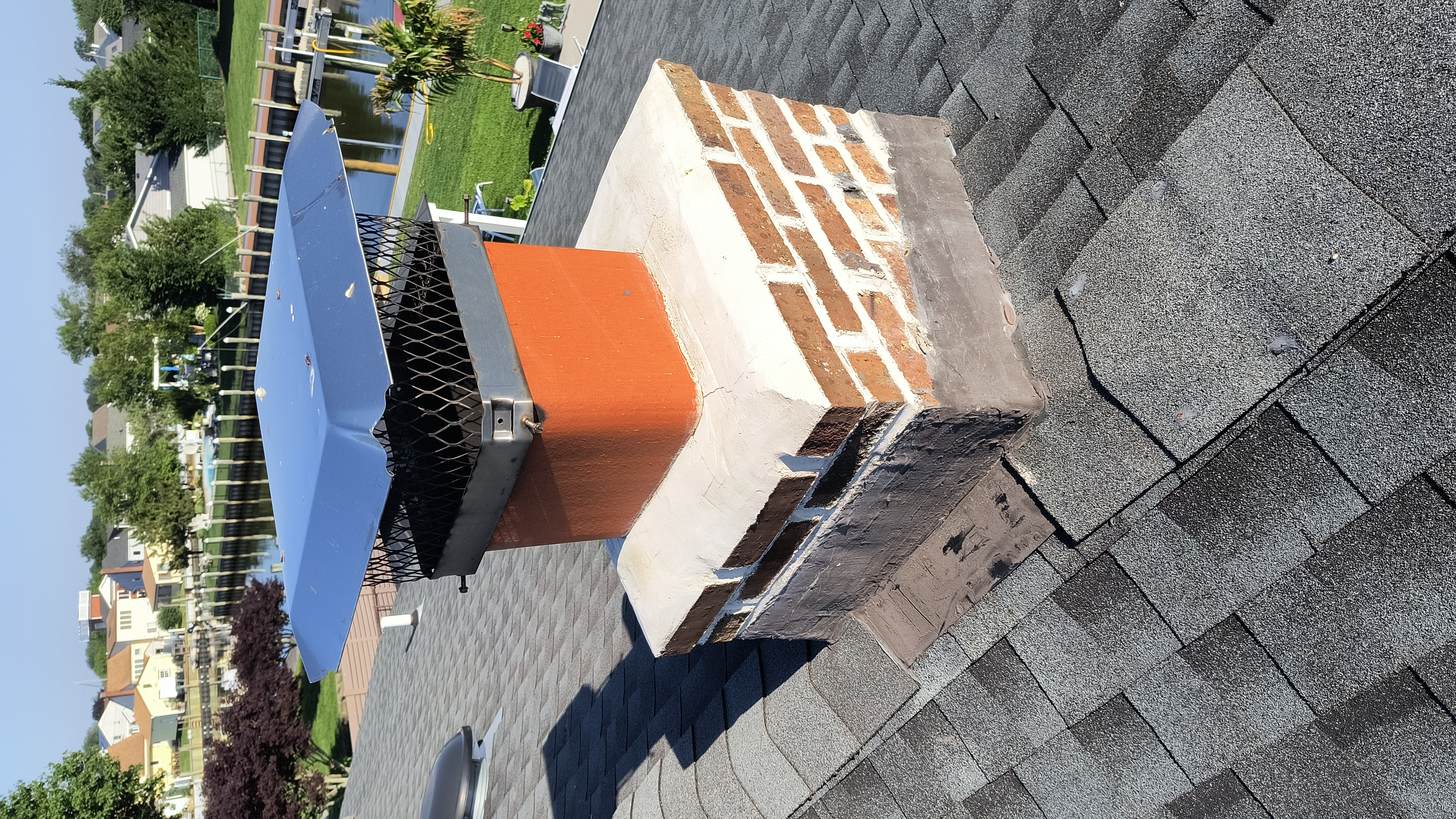 Full chimney masonry rebuild and restoration in Lynbrook, NY