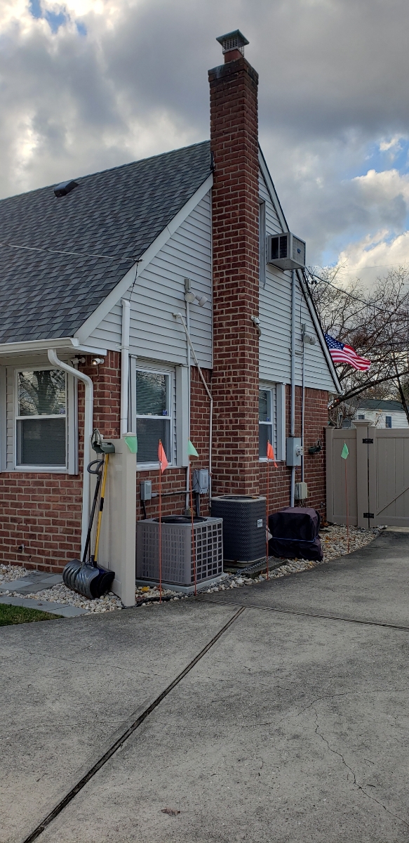 Professional chimney repointing restoring brick joints in Lynbrook, NY