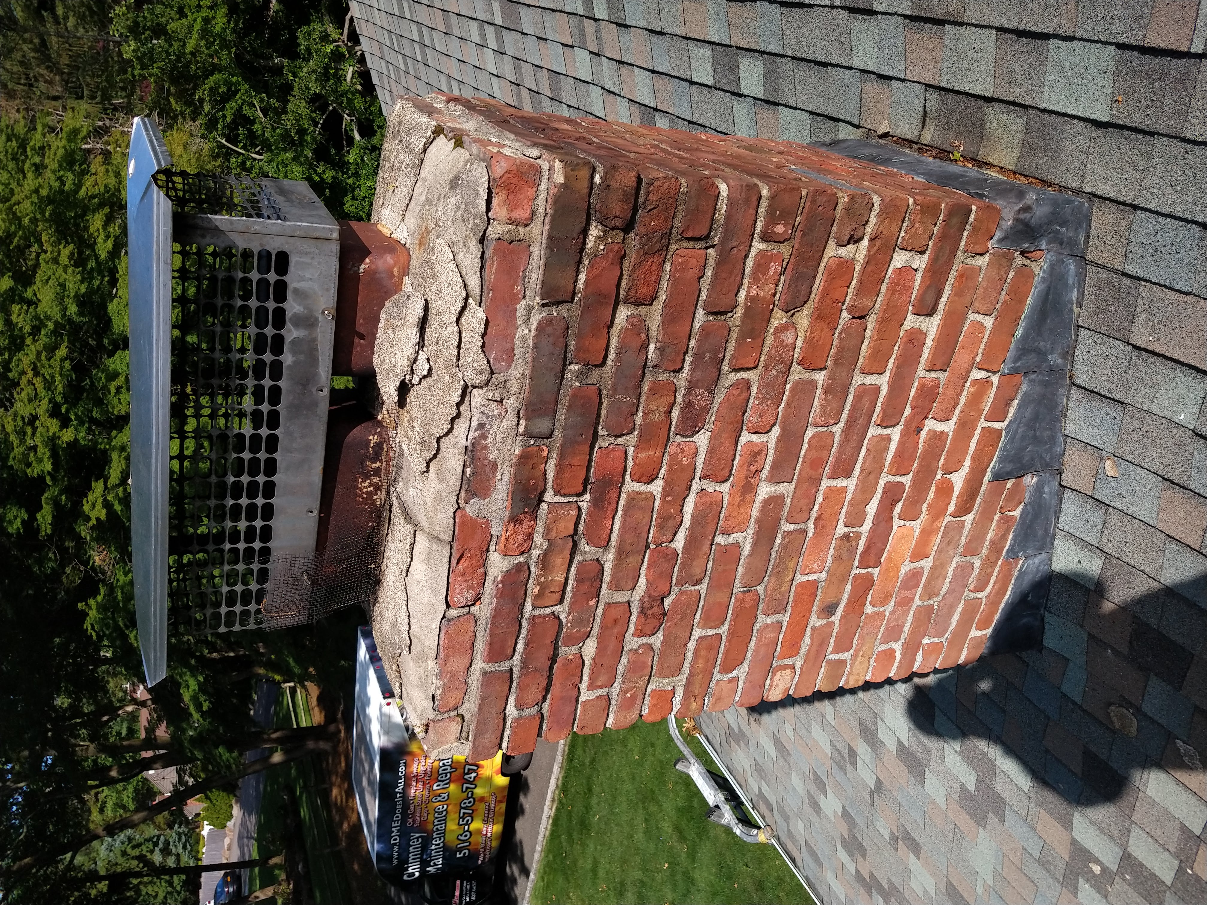 Cracked chimney crown professionally repaired in Lynbrook, New York
