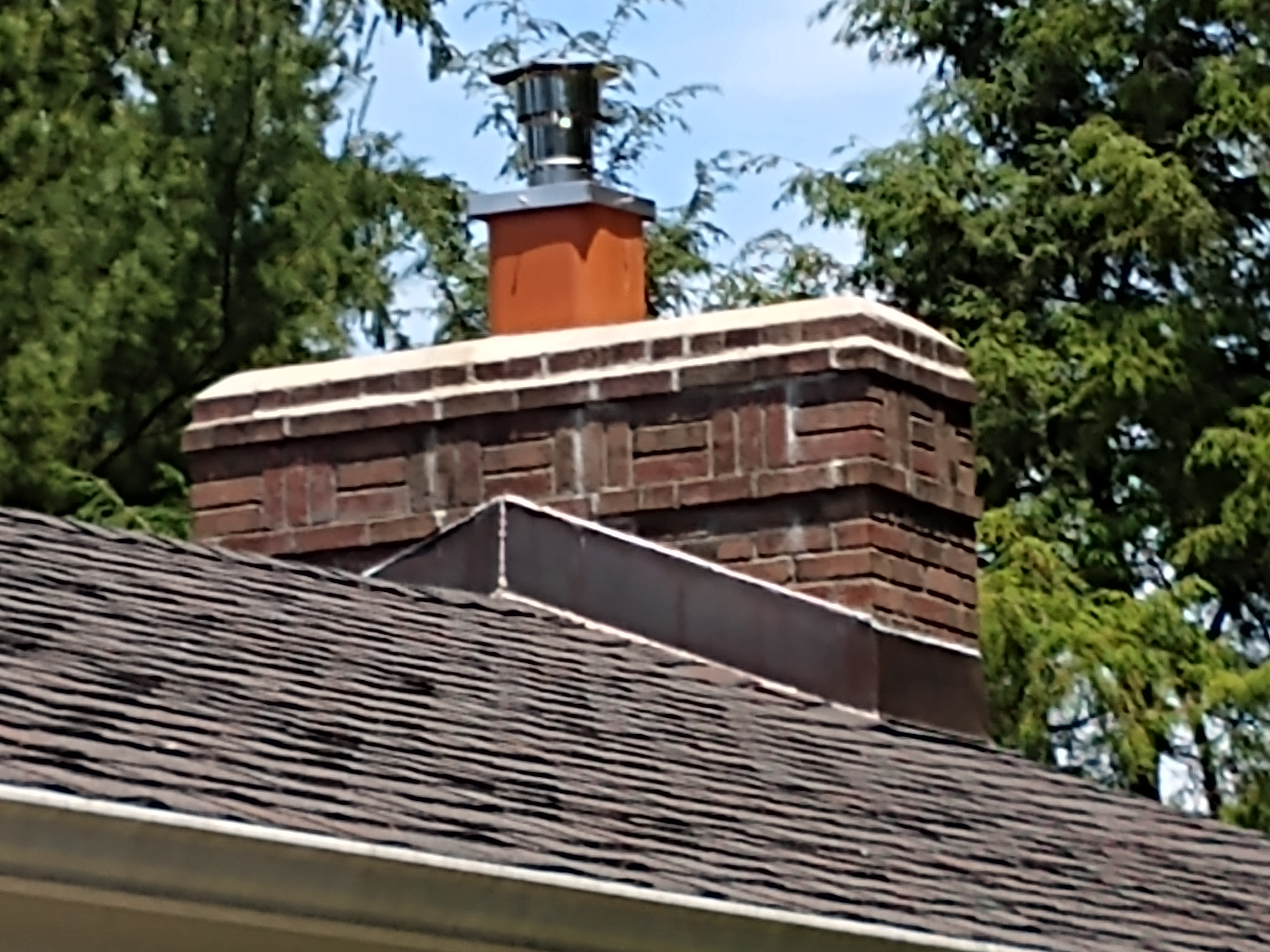 Stainless steel chimney cap with animal guard in Lynbrook, New York